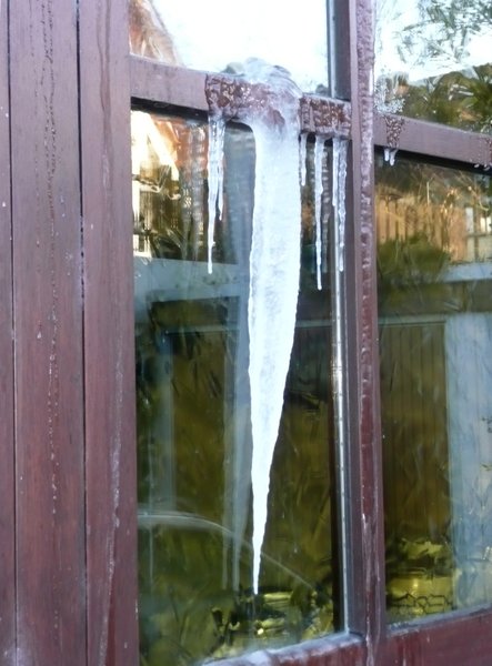Icicle: Big Icicle on a window caused by water pipe burst one floor above
