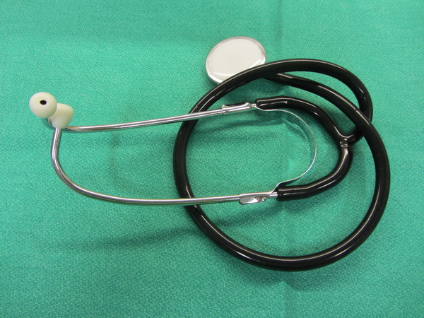 Stethoscope: Nurses stethoscope on a green blanket
