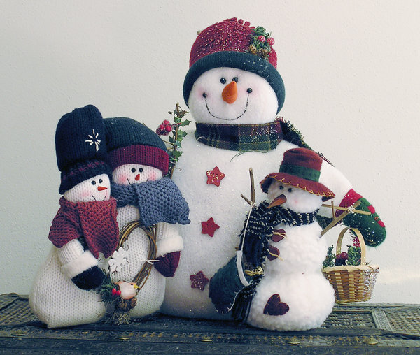 Snow Family: A cuddly group of snowmen.