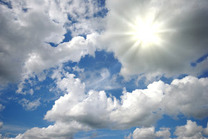 Sun over the clouds: Wide sky with clouds and sunrays