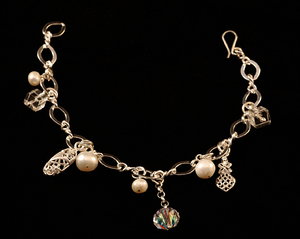 Silver bracelet with pearls an: Wristlet