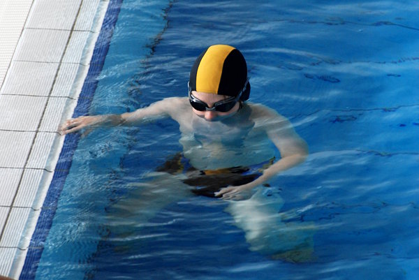 Lesson of swimming 2: Boy in the water