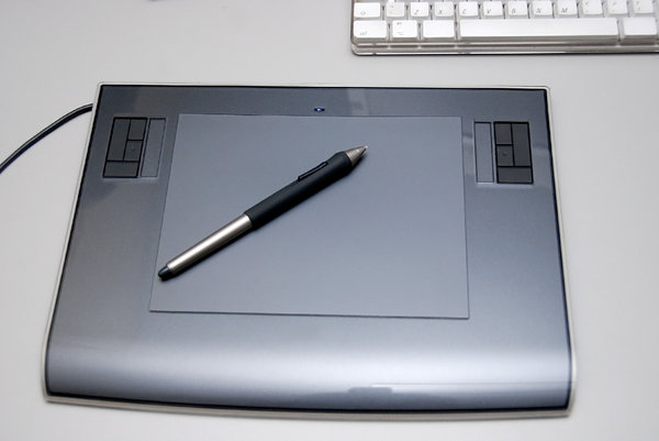 Graphics tablet  1: Digitizing tablet is a computer input device that allows one to hand-draw images and graphics, similar to the way one draws images with a pencil and paper. 