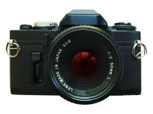 camera: vintage SLR camera.