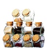 Pyramid of spices: glasses with spices and herbs forming a pyramid