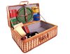 Open picnic basket: Open picnic basket with cups, plates, a bottle of wine, cheese and a sausage. Isolated with white background.