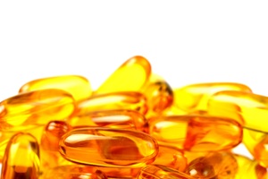 Fish oil: Fish oil pills with white background