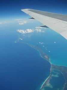 Caribbean Flight: Flying over islands within the caribbean sea somewhere close to Cuba and Jamaica.