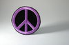 Peace Patch 2: A Photo of a clothing patch that is a peace sign.