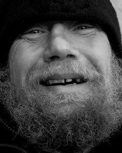 Smiling Homeless: Randy, A familiar figure on the streets of downtown Milwaukee, muggs my camera