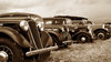 Classic cars in sepia: Vintage cars in a row
