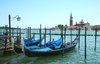 Gondolas: Gondolas in evening light in Venice, with the church of San Giorgio Maggiore in the background.