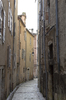 Alley: An alley in an old town in the Dordogne, France.