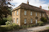Village house: A sandstone house in a village in Somerset, England.