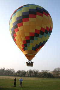 Hot Air Balloon: Launching a hot air balloon in early evening in England in spring.