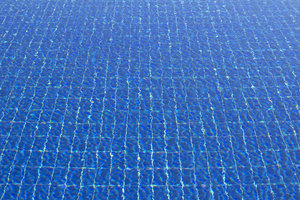 Swimming pool ripples: Ripples on a large outdoor swimming pool.