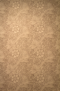 Floral wallpaper: Old William Morris (died 1896) wallpaper on display in Standen House, a National Trust property at which photography is freely permitted.