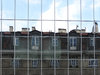 Mirroring windows: A windows of a modern office building.