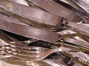 Dirty cutlery: In the sink.