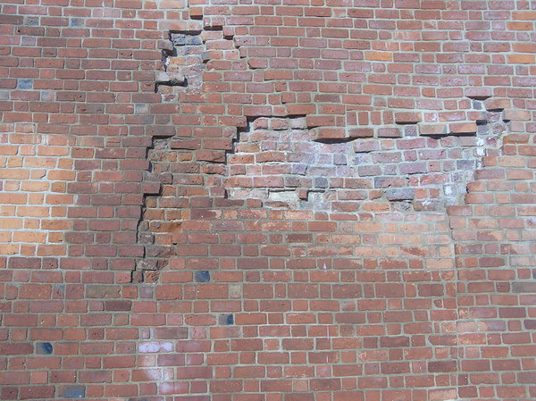 Wall: A cracked wall.