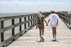 Hand in Hand: Walking down the dock