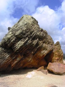 Agglestone Rock, Dorset: The Agglestone Rock can be found near Studland village in Dorset. A sandstone block weighing 400 tonnes perched on a conical hill.