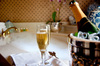 Bubbly and Bubbly: Champagne and a bubbly bath.