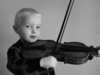 Violinist: This was a picture taken a number of years ago, before digital cameras. I have scanned it in and done a certain amount of retouching and could do with a bit more work but Istill think it is a nice pic. It is of my son David, who is now considerably older.