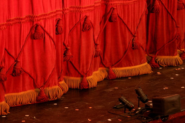 Theatre Stage: Close-up of front of stage with curtains closed