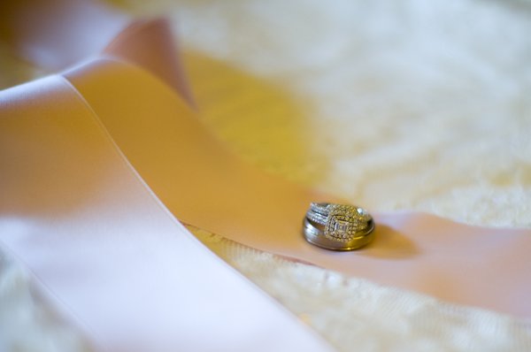 Rings: The wedding rings on the gown.