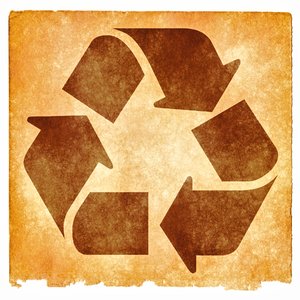 Recycling Grunge Sign: Grunge textured recycling symbol on vintage paper, with sepia toning for a more aged feel.