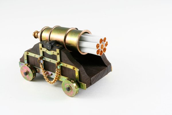 Smoking Kills: Miniature cannon with cigarettes in its barrel. A visual concept to convey that smoking kills.