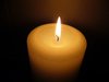Burning Candle: A lighted candle