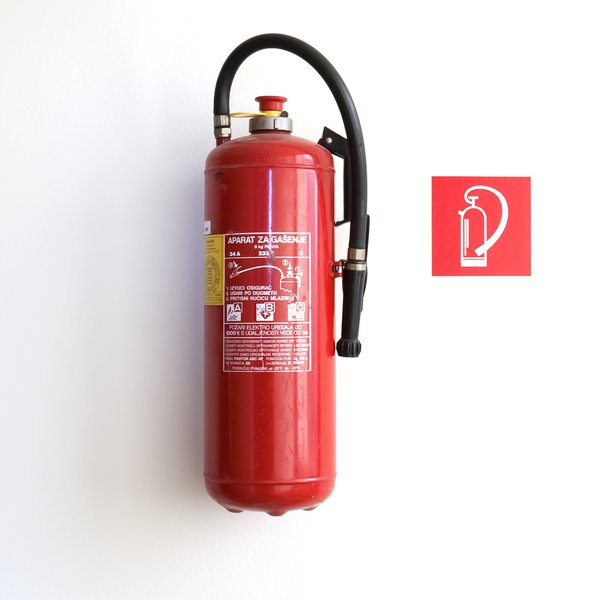Fire Extinguisher: Fire extinguisher hanging on the wall