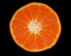 Mandarin: Macro shot of a cross section of a mandarin.