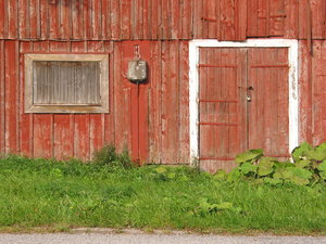 door and window: Door and window (sort of). From an old building on the countryside north of Ystad, Sweden.