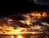 sombre southern sunset series: approaching storm clouds in Southern skies with brilliant setting sun