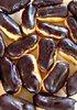 chocolate eclairs: chocolate eclairs removed from refrigerator