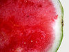 water melon red: cut water melons - green exterior, red interior