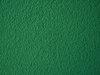 green textured wall surface: textured green wall