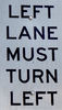reflective left turn sign: reflective left turn vehicular traffic sign - only one way to go