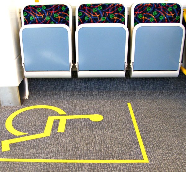 wheel chair seating: wheel chair access and seating area on suburban train