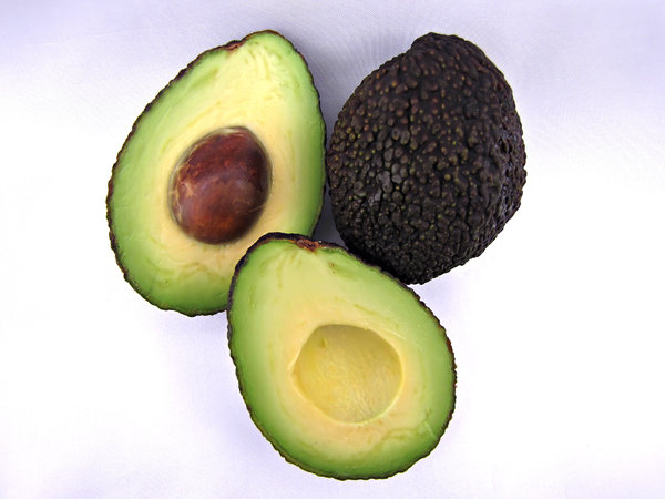 avocados - ripe: dark ripe avocados - cross section and seed