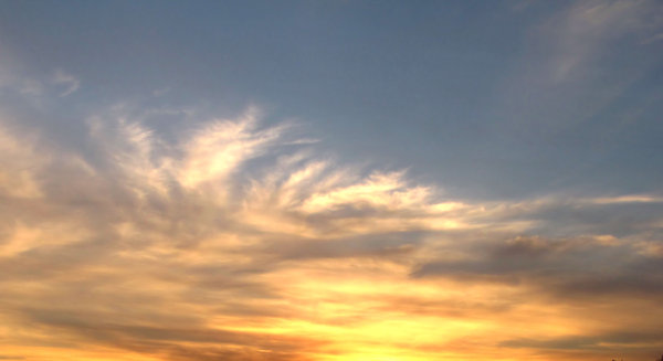 sunset skies: soft cloud formations at sunset
