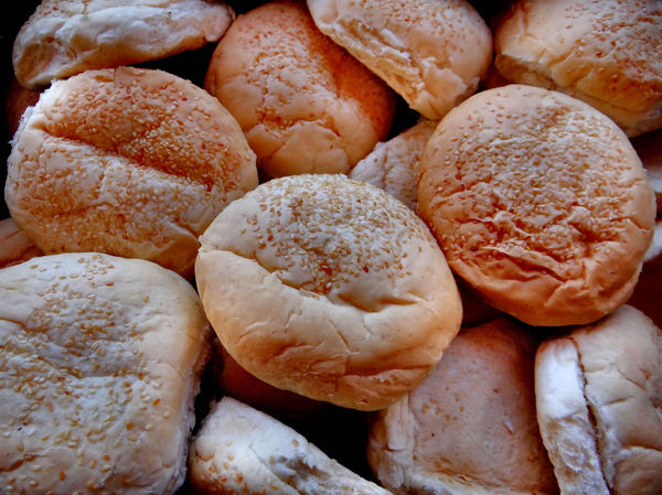 sesame burger buns2b: large sesame covered bread rolls,