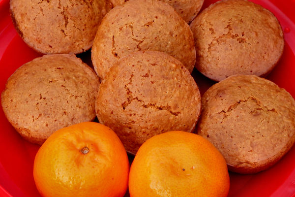 mandarin muffins2: plate of freshly baked mandarin flavoured muffins - cupcakes