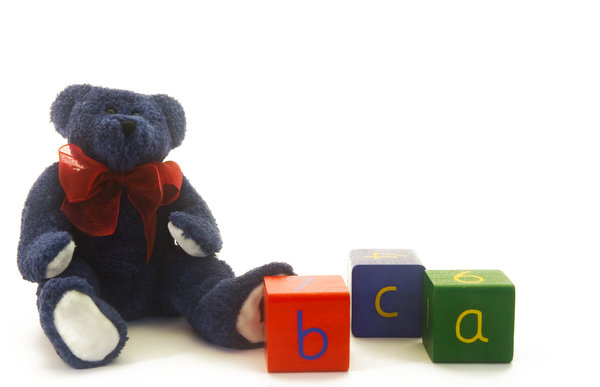 ABC Teddy: Blue teddybear with wooden RGB alpha blocks.