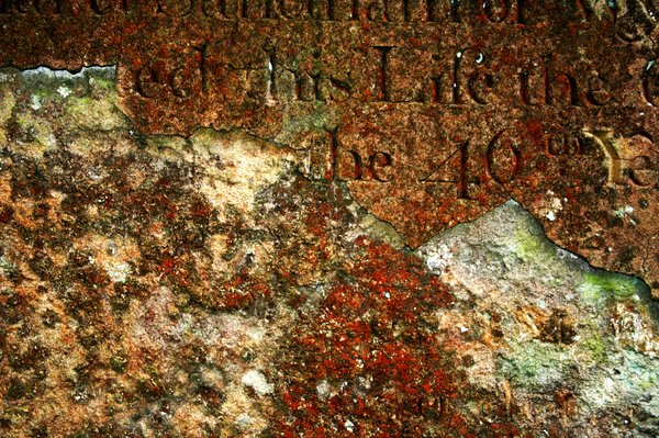 Ancient Grave: Decaying tombstone texture.