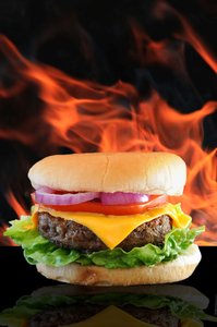 Flame Burger: Cheese burger against a flame background