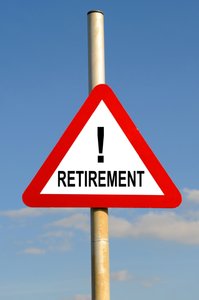 Retirement: Red warning triangle retirement concept